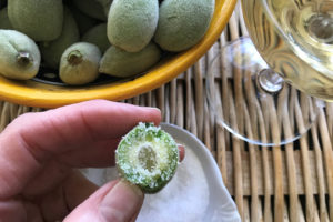 Green almond dipped in salt as snack
